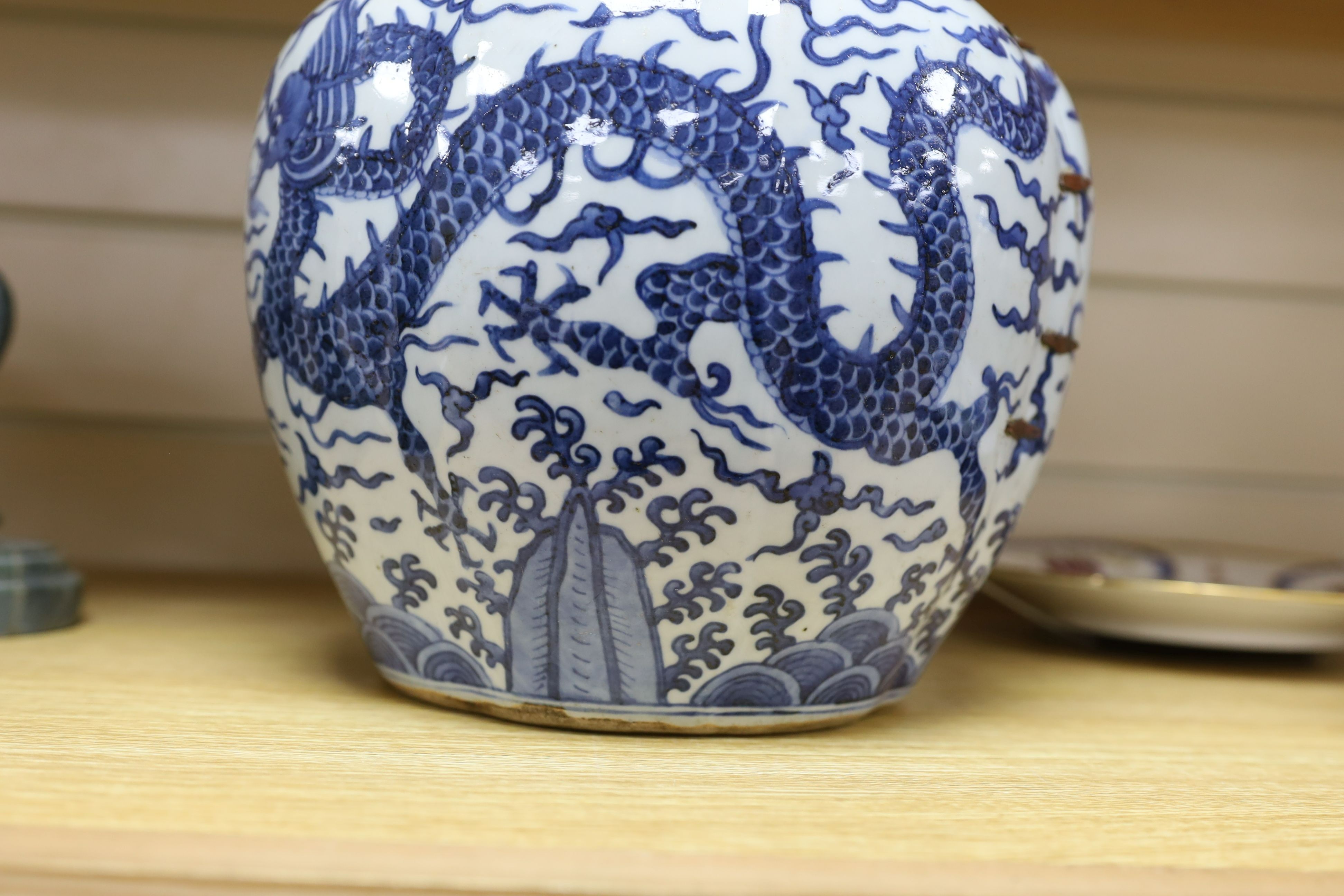 A Chinese blue and white ‘dragon jar, Wanli mark and possibly of the period, 23 cm high